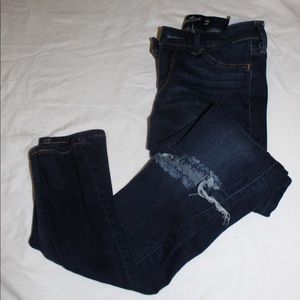 hollister jeggings with one hole in the knee